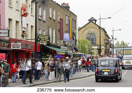 People walking on sidewalk, Camden, London, England View Large Photo Image Stock Photography - People walking on sidewalk, Camden, London, England . Fotosearch