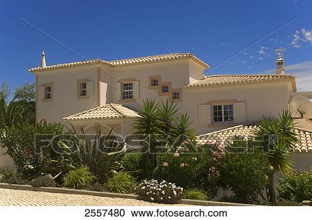 Plants in front of building, Parque Da Floresta, Algarve, Portugal View Large Photo Image Stock Image - Plants in front of building, Parque Da Floresta, Algarve, Portugal . Fotosearch