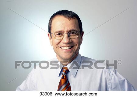 Portrait of businessman smiling View Large Photo Image Stock Photograph - Portrait of businessman smiling . Fotosearch