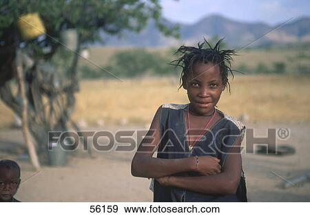 Stock Photo - Portrait of girl smiling, Namibia . Fotosearch