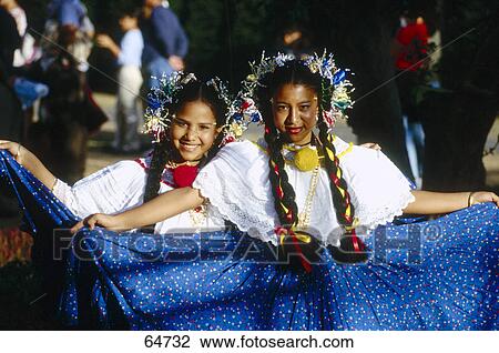 Stock Image - Portrait of two young women in tradition clothing . Fotosearch