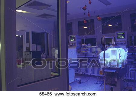 Premature baby in incubator View Large Photo Image Stock Photograph - Premature baby in incubator . Fotosearch