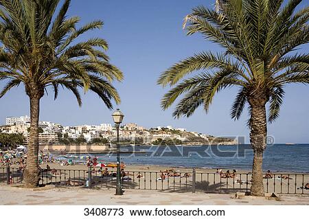 Promenade and beach of Ses Figueretes, Ibiza, Spain View Large Photo Image Stock Image - Promenade and beach of Ses Figueretes, Ibiza, Spain . Fotosearch