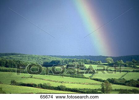 Picture - Rainbow over landscape, Morvan, Burgundy, France . Fotosearch