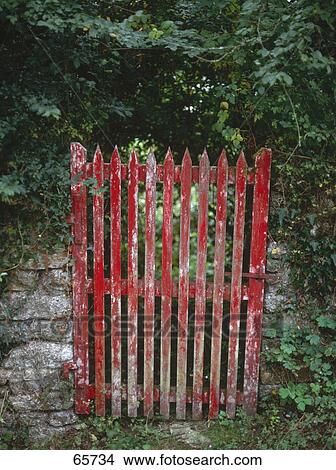 Red gate of garden wall View Large Photo Image Picture - Red gate of garden wall . Fotosearch