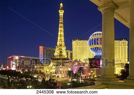 Stock Photo - Replica of Eiffel tower lit up at night, Las Vegas, Nevada, USA . Fotosearch