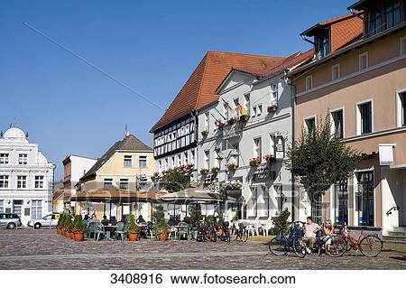 Restaurant at the marketplace of Ueckermuende, Germany View Large Photo Image Stock Photograph - Restaurant at the marketplace of Ueckermuende, Germany . Fotosearch