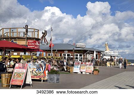 Stock Photograph - Restaurants along a promenade, List, Sylt, Schleswig-Holstein, Germany . Fotosearch