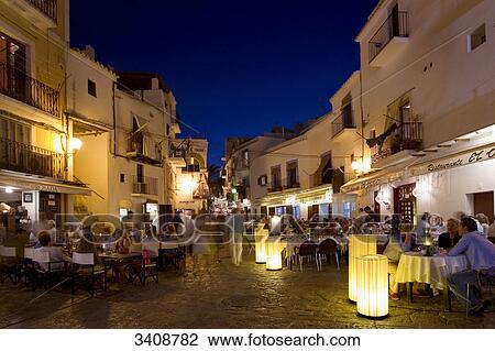 Restaurants in the old town of Ibiza City, Ibiza, Spain View Large Photo Image Stock Image - Restaurants in the old town of Ibiza City, Ibiza, Spain . Fotosearch