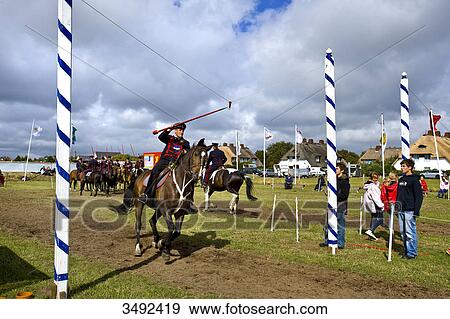Stock Photo - Ringreiten, Keitum, Sylt, Nordfriesland, Schleswig-Holstein, Germany . Fotosearch