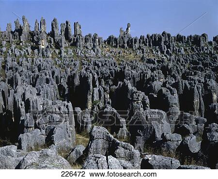 Rock formations on landscape, China View Large Photo Image Stock Image - Rock formations on landscape, China . Fotosearch