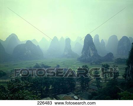 Rock formations on rural landscape, China View Large Photo Image Stock Image - Rock formations on rural landscape, China . Fotosearch