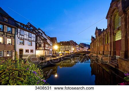 Row of houses along a canal, Colmar, France, elevated view View Large Photo Image Stock Image - Row of houses along a canal, Colmar, France, elevated view . Fotosearch