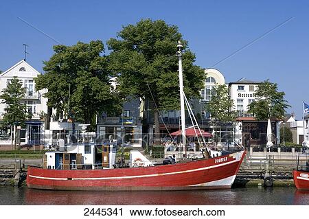 Sailboat at dock, Warnemunde, Rostock, Mecklenburg-West Pomerania, Germany View Large Photo Image Stock Image - Sailboat at dock, Warnemunde, Rostock, Mecklenburg-West Pomerania, Germany . Fotosearch