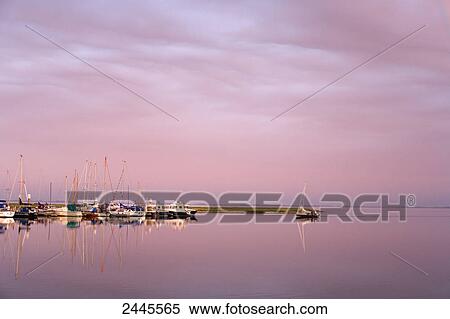 Sailboats at dock at dusk, Spiekeroog, Lower Saxony, Germany View Large Photo Image Stock Photography - Sailboats at dock at dusk, Spiekeroog, Lower Saxony, Germany . Fotosearch