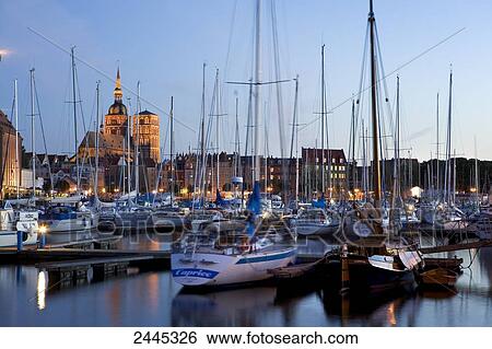 Sailboats at harbor, St. Nikolai Church, Stralsund, Mecklenburg-Western Pomerania, Germany View Large Photo Image Stock Photograph - Sailboats at harbor, St. Nikolai Church, Stralsund, Mecklenburg-Western Pomerania, Germany . Fotosearch