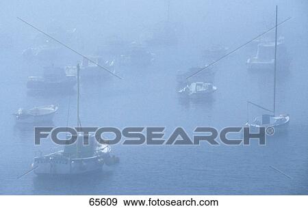 Sailboats at port in foggy weather, Cote d emeraude, Brittany, France View Large Photo Image Stock Photo - Sailboats at port in foggy weather, Cote d emeraude, Brittany, France . Fotosearch