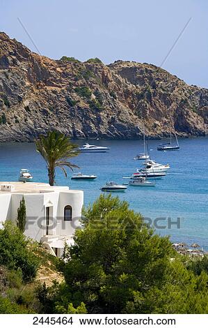 Picture - Sailboats in sea, Cala Jondal, Ibiza, Balearic Islands, Spain . Fotosearch