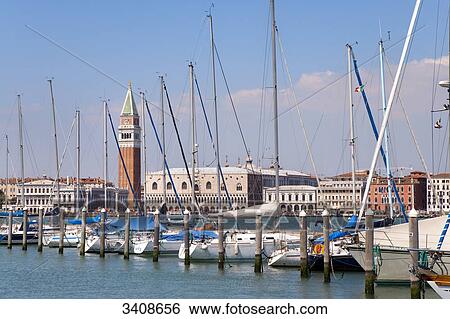 Stock Photograph - Sailing boats in the harbour of Venice, Italy . Fotosearch