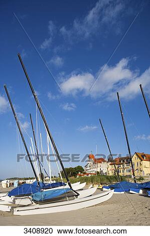 Stock Image - Sailing boats on the beach of Kuehlungsborn, Germany . Fotosearch