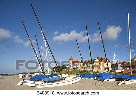 Sailing boats on the beach of Kuehlungsborn, Germany View Large Photo Image Stock Photo - Sailing boats on the beach of Kuehlungsborn, Germany . Fotosearch