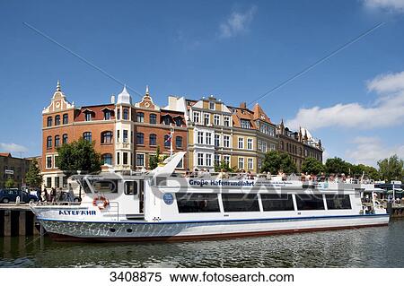 Ship with tourists at the harbour of Stralsund, Germany View Large Photo Image Stock Photography - Ship with tourists at the harbour of Stralsund, Germany . Fotosearch