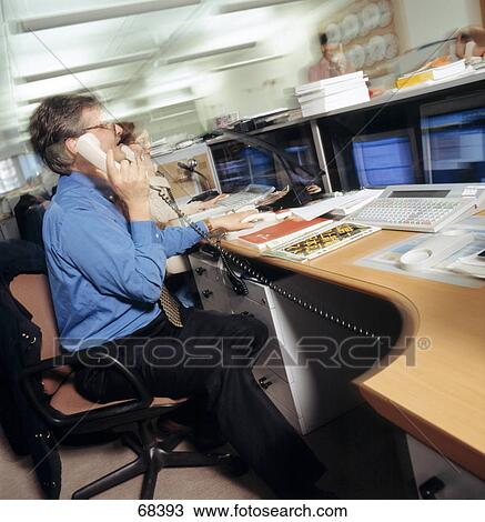 Side profile of businesswoman talking on landline phone View Large Photo Image Stock Image - Side profile of businesswoman talking on landline phone . Fotosearch