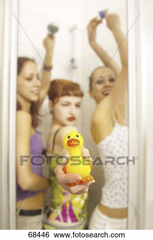 Side profile of three teenage girls having fun in bathroom View Large Photo Image Stock Photograph - Side profile of three teenage girls having fun in bathroom . Fotosearch