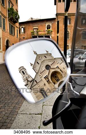 Side view mirror of a motorbike reflecting the Cathedral of Verona, Italy View Large Photo Image Stock Photography - Side view mirror of a motorbike reflecting the Cathedral of Verona, Italy . Fotosearch
