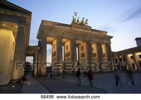 Stock Photo - Silhouette of people in front of gate, Brandenburg Gate, Berlin, Germany . Fotosearch