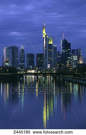 Skyscrapers lit up at night, Frankfurt, Hesse, Germany View Large Photo Image Stock Photography - Skyscrapers lit up at night, Frankfurt, Hesse, Germany . Fotosearch