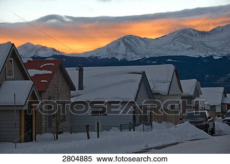 Snow covered houses at dusk, Colorado, USA View Large Photo Image Stock Photography - Snow covered houses at dusk, Colorado, USA . Fotosearch