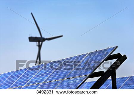 Solar panels and wind turbine, Pellworm, North Frisian Islands, Germany, close-up View Large Photo Image Stock Image - Solar panels and wind turbine, Pellworm, North Frisian Islands, Germany, close-up . Fotosearch