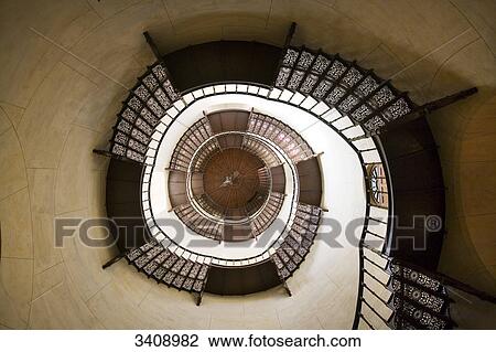 Stock Image - Spiral staircase in the hunting lodge Granitz, Ruegen, Germany, directly below . Fotosearch