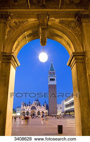 St. Marcus Square seen through an arch, Venice, Italy View Large Photo Image Stock Photo - St. Marcus Square seen through an arch, Venice, Italy . Fotosearch