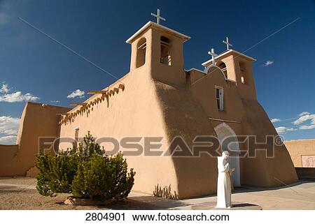 Statue in front of church, Franz von Assisi Church, Taos, New Mexico, USA View Large Photo Image Stock Image - Statue in front of church, Franz von Assisi Church, Taos, New Mexico, USA . Fotosearch
