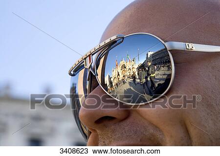 Sunglasses reflecting St Marks Square, Venice, Italy View Large Photo Image Stock Image - Sunglasses reflecting St Marks Square, Venice, Italy . Fotosearch