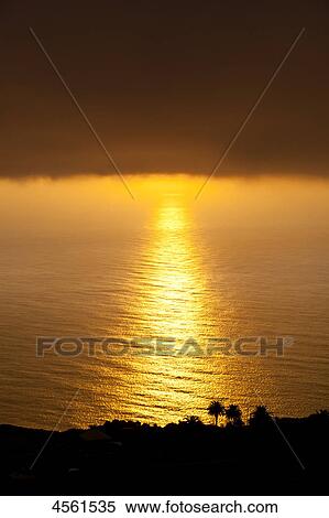 Stock Photography - Sunset with fog, La Palma, Canary Islands, Spain . Fotosearch