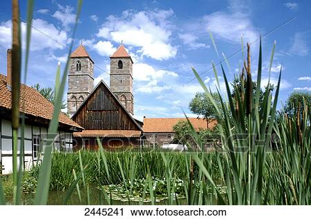 Tall grass in pond in front of church, Themar, Thuringia, Germany View Large Photo Image Stock Image - Tall grass in pond in front of church, Themar, Thuringia, Germany . Fotosearch