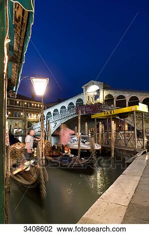 Taxi rank with gondolas at the Rialto Bridge Venice, Italy View Large Photo Image Stock Image - Taxi rank with gondolas at the Rialto Bridge Venice, Italy . Fotosearch