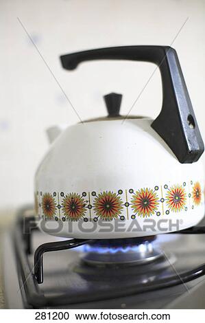 tea pot on a gas oven View Large Photo Image Stock Image - tea pot on a gas oven . Fotosearch
