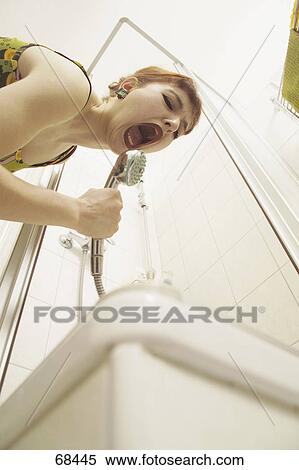 Teenage girl having fun in bathroom View Large Photo Image Stock Photography - Teenage girl having fun in bathroom . Fotosearch