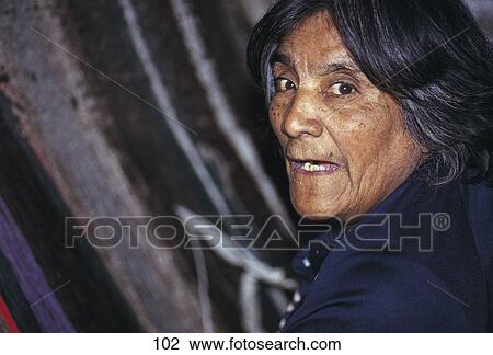 Tehuelche Indian woman weaving with a loom, Patagonia, Argentina View Large Photo Image Stock Image - Tehuelche Indian woman weaving with a loom, Patagonia, Argentina . Fotosearch