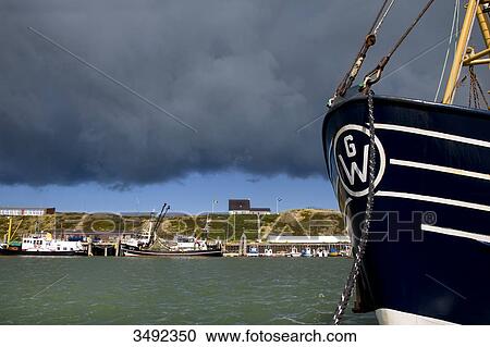 Thunderclouds above the harbour of Hoernum, Sylt, Germany View Large Photo Image Stock Image - Thunderclouds above the harbour of Hoernum, Sylt, Germany . Fotosearch