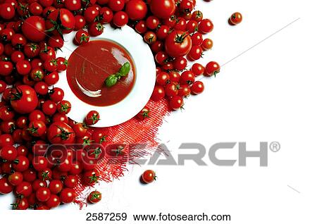 Tomatoes and tomato soup, elevated view View Large Photo Image Stock Photo - Tomatoes and tomato soup, elevated view . Fotosearch