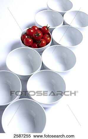 Tomatoes in a bowl, elevated view View Large Photo Image Stock Photography - Tomatoes in a bowl, elevated view . Fotosearch