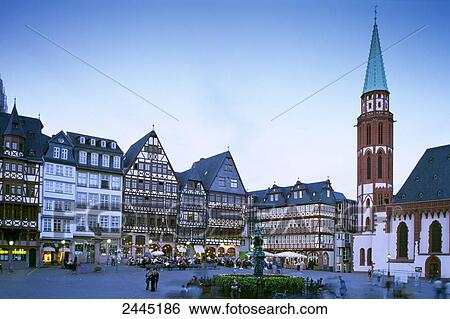 Stock Photograph - Tourists at market during dusk, Frankfurt, Hesse, Germany . Fotosearch