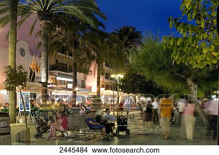 Tourists at marketplace during dusk, Ibiza, Balearic Islands, Spain View Large Photo Image Picture - Tourists at marketplace during dusk, Ibiza, Balearic Islands, Spain . Fotosearch