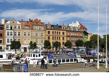 Stock Photo - Tourists at the harbour of Stralsund, Germany . Fotosearch