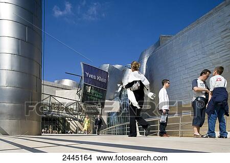 Tourists in front of art museum, Guggenheim Museum, Bilbao, Spain View Large Photo Image Picture - Tourists in front of art museum, Guggenheim Museum, Bilbao, Spain . Fotosearch